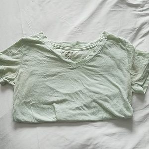 Pastel colored V-neck shirt